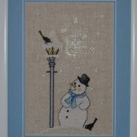Under the lantern - sewn and framed